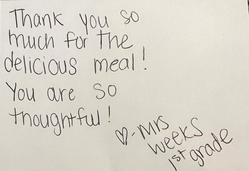 A handwritten thank you note from "Mrs. Weeks 1st grade" for a delicious meal.