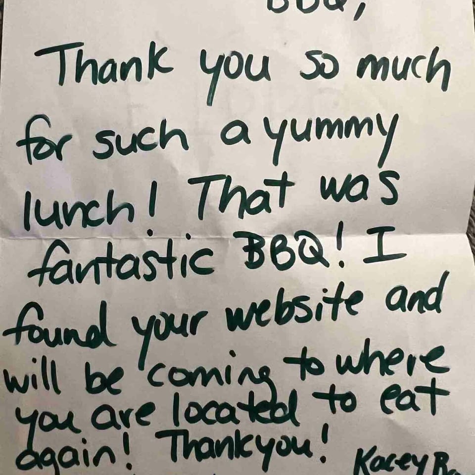 A handwritten thank you note to Emerald's Touch BBQ from Kacey Brown of Eagle Ridge Academy.
