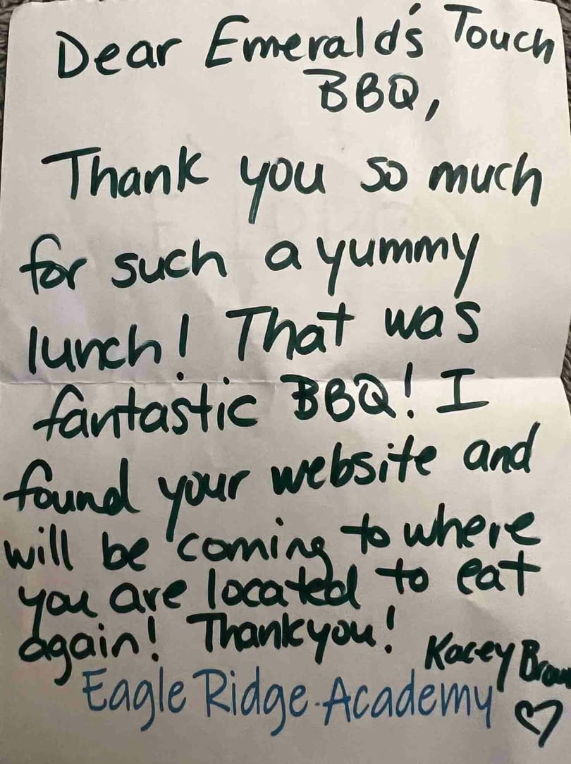 A handwritten thank you note to Emerald's Touch BBQ from Kacey Brown of Eagle Ridge Academy.